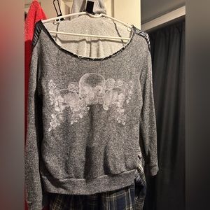 large. mostly grey with a black stripe down the arms. don’t wear anymore.